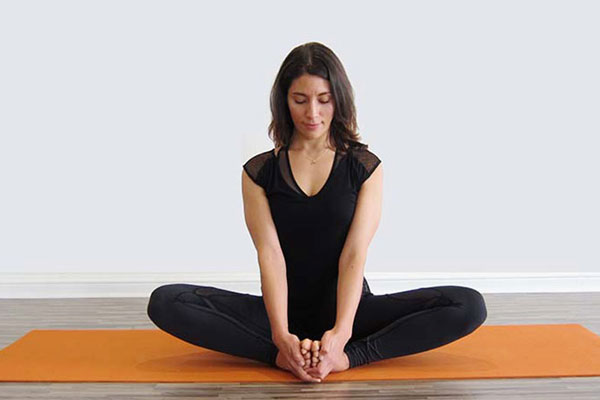 postura yoga Baddha Konasana