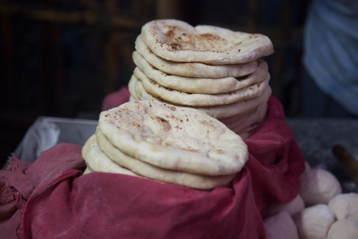 Pan cocinado en India. Foto de Flickr.