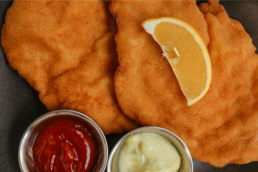 La milanesa napolitana es uno de los platillos icónicos dentro de la gastronomía de Buenos Aires.