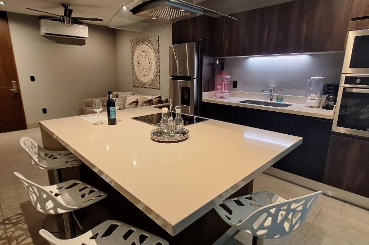 Cocina y sala de las residencias de IT Boutique Hotel, foto de Miriam Carmo